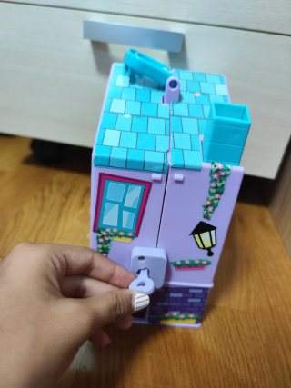 Casita maletin + llave + muñeca, ambos Barriguitas