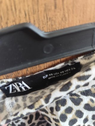 Falda Zara animal print XS