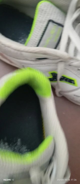 Botas de fútbol sala Joma blancas y verdes