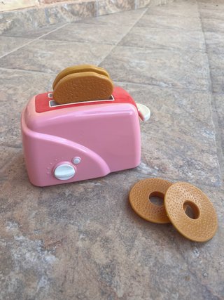 Tostadora de juguete rosa con accesorios