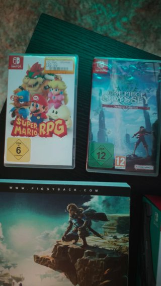 Nintendo Switch OLED con juegos y accesorios