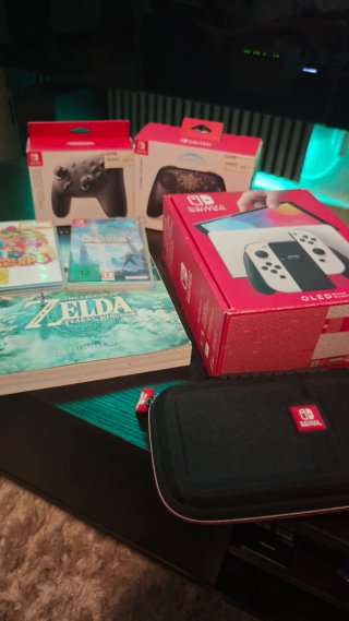 Nintendo Switch OLED con juegos y accesorios