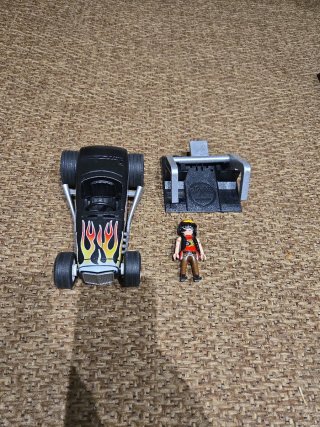 Coche Playmobil con figura y accesorio