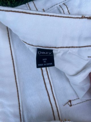 Pantalones mujer marrones y blancos