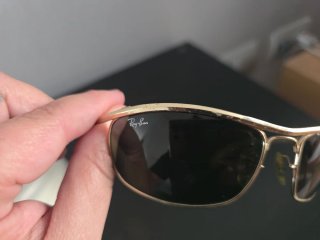 Gafas de sol Ray-Ban doradas y negras