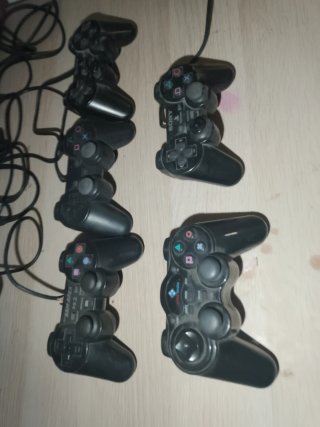 Consola PS2 Negra + 5 Mandos y 4 Juegos