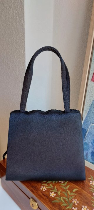 Bolso de fiesta negro con abalorios