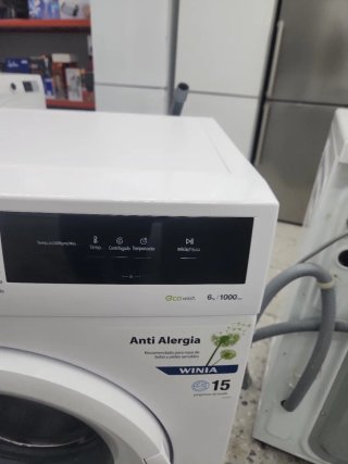 LAVADORA WHINIA GARANTIA TRANSPORTEi