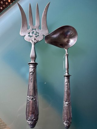 Antiguos cubiertos de plata para servir