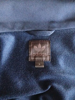 Chaqueta Adidas azul y naranja