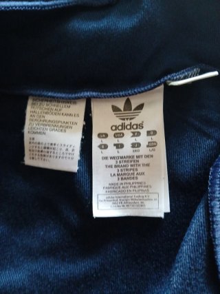 Chaqueta Adidas azul y naranja
