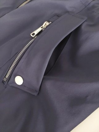 Parka cortavientos reversible azul