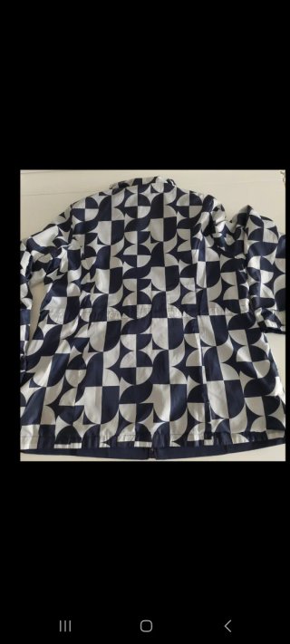 Parka cortavientos reversible azul