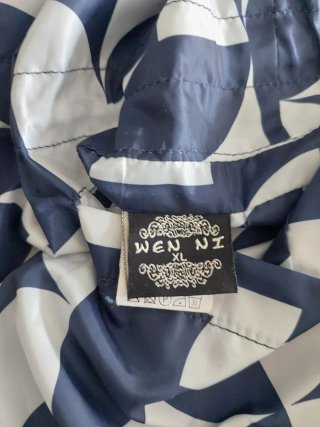 Parka cortavientos reversible azul