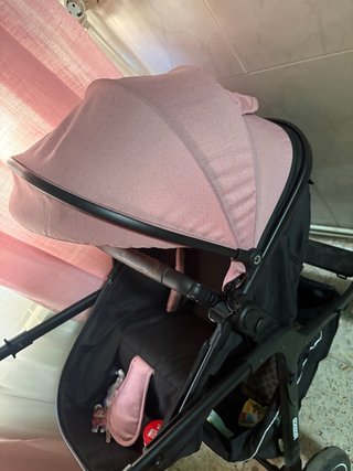 Cochecito niña rosa casi nuevo