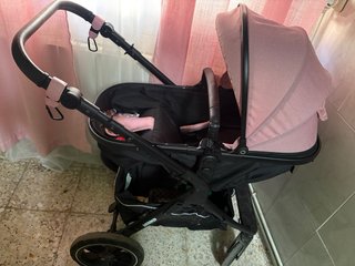 Cochecito niña rosa casi nuevo