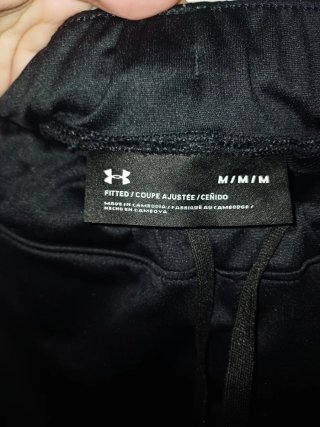 Pantalón chándal Under Armour negro/blanco