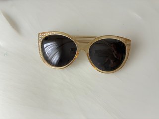 Gafas de sol Guess doradas y negras
