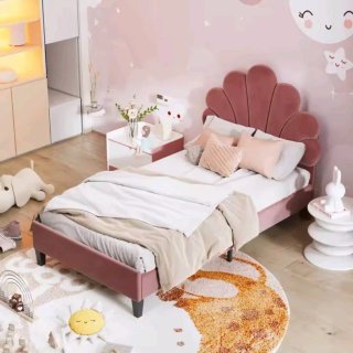 Cama individual rosa estilo concha.
