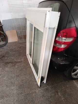 Ventana corredera blanca ancho 119- 131 alto..15 f