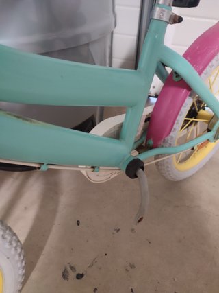 Bicicleta infantil color turquesa y rosa