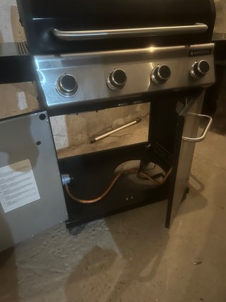 Barbacoa de gas negra y plateada