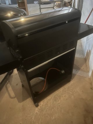 Barbacoa de gas negra y plateada