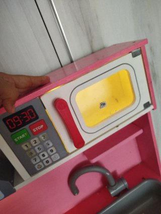 Cocina de juguete rosa