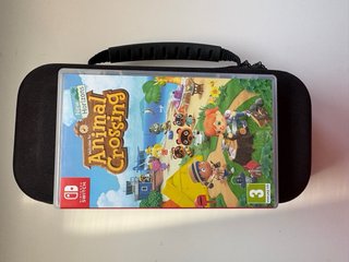 Nintendo Switch Lite + Animal Crossing+ funda.