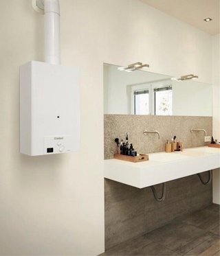 Calentador Vaillant turboMAG Pro 12,5L + chimenea