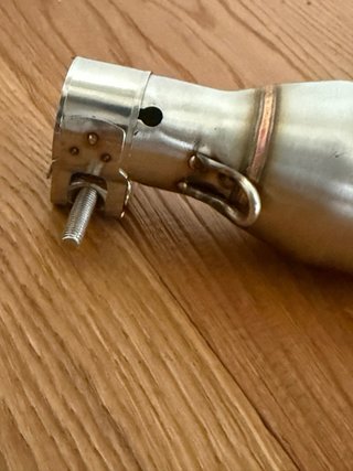 Riduttore scarico moto