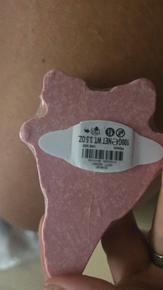 Bomba de baño rosa y dorada