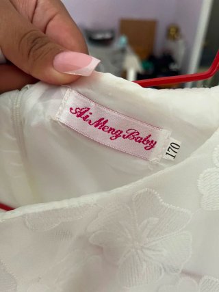 Vestido de comunión blanco con lazo morado