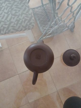 Tetera y vaso de arcilla