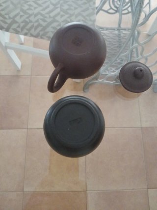 Tetera y vaso de arcilla