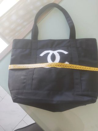 Borsa shopper Chanel nera con logo con paillettes