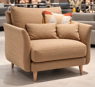 Sillón NUEVO tapizado beige con puf a juego
