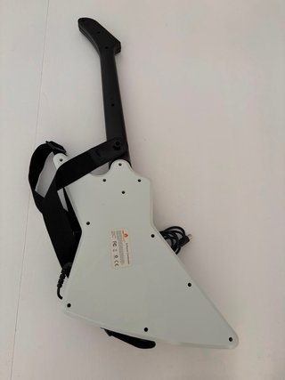 Guitarra de consola con correa