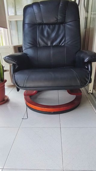 Sillón de masaje de cuero negro