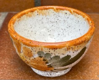 Ciotolina in ceramica arancione e bianca