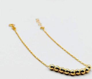 Pulsera de oro 18 kilates con bolitas 1.33 g