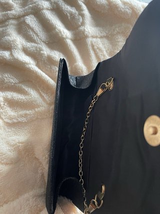 Bolso de fiesta negro y dorado