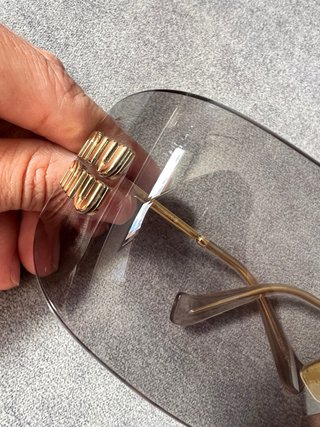 Gafas Miu Miu gris y dorado