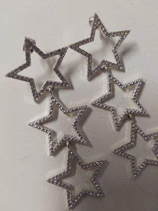 Pendientes largos de estrellas con diamantes