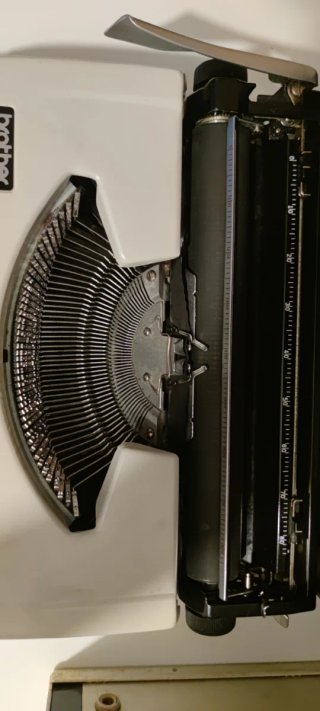 Máquina de escribir portátil Olympia y Brother