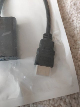 Adaptador HDMI a VGA.
