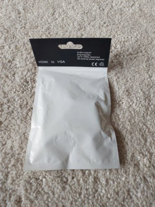 Adaptador HDMI a VGA.
