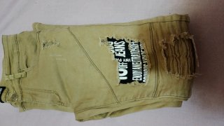 Pantalones vaqueros mujer beige desgastados