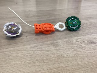Beyblade con lanzador de cremallera