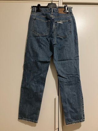 Pantalones vaqueros altos rotos